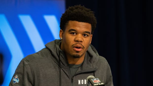 Penn State defensive end Chop Robinson meets with the media at the 2024 NFL Scouting Combine in Indianapolis.
